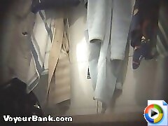 12 movies - Voyeur scrutinizes barren buns in girls' locker room Part 1