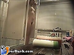 12 movies - Young slim doll getting spied after in the showers Part 1