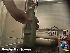 12 movies - Young slim doll getting spied after in the showers Part 1