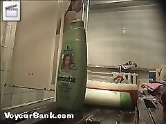 12 movies - Young slim doll getting spied after in the showers Part 1