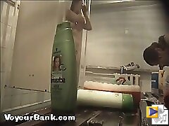 12 movies - Young slim doll getting spied after in the showers Part 2