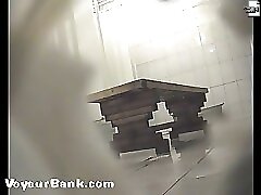 12 movies - Awesome voyeur shoot from the girls' shower room Part 1