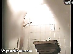 12 movies - Spying after a freshie shaving her pussy in shower Part 3