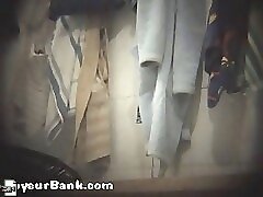 12 movies - Voyeur scrutinizes barren buns in girls' locker room Part 1